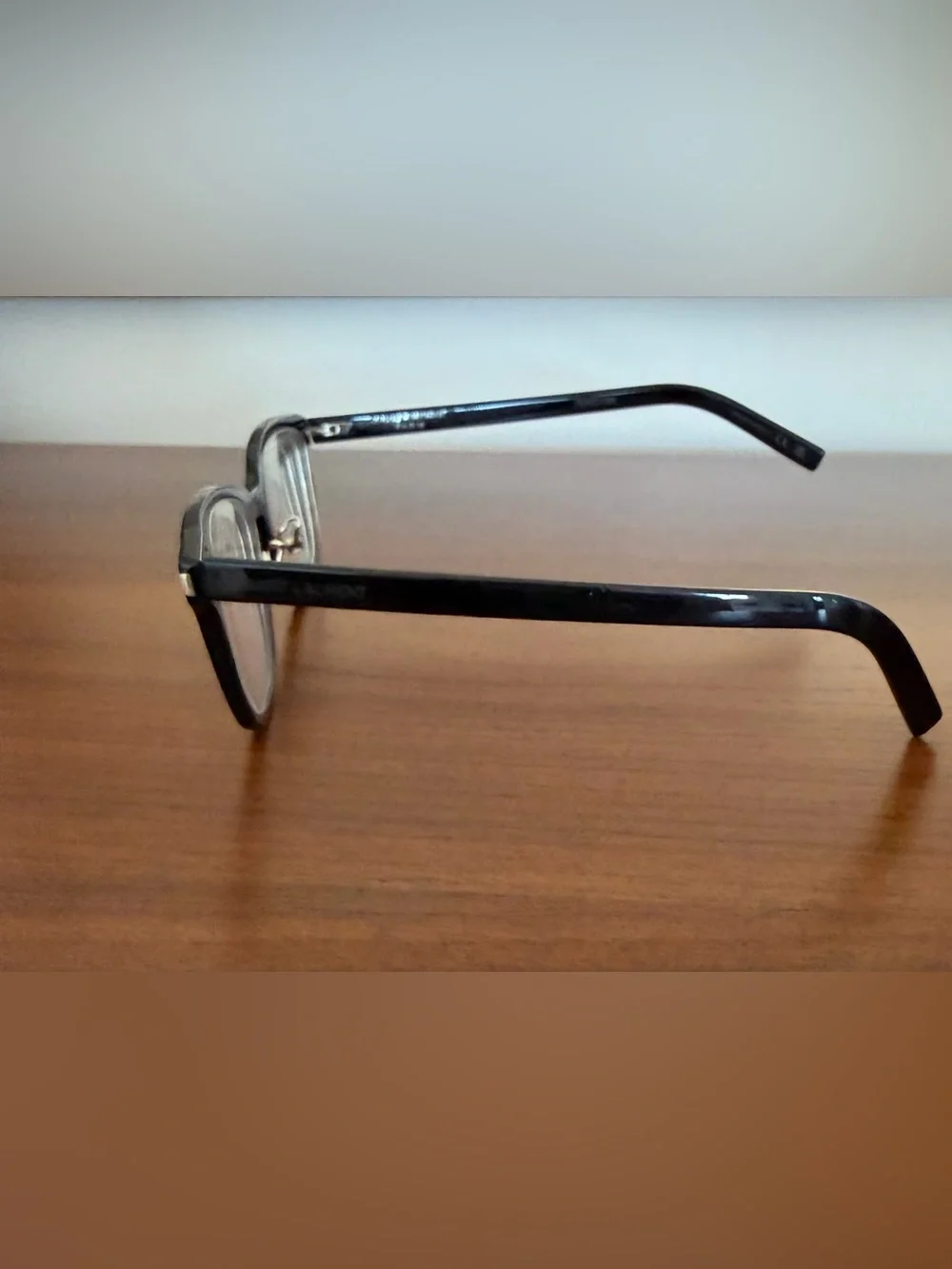 Saint Laurent Black Frames with Blue-Tinted Lenses